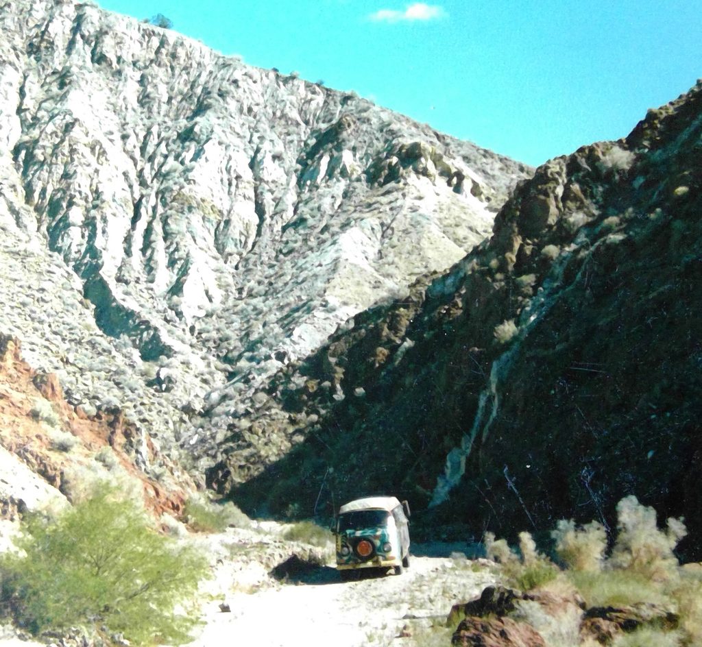 vw bus in desert mountains